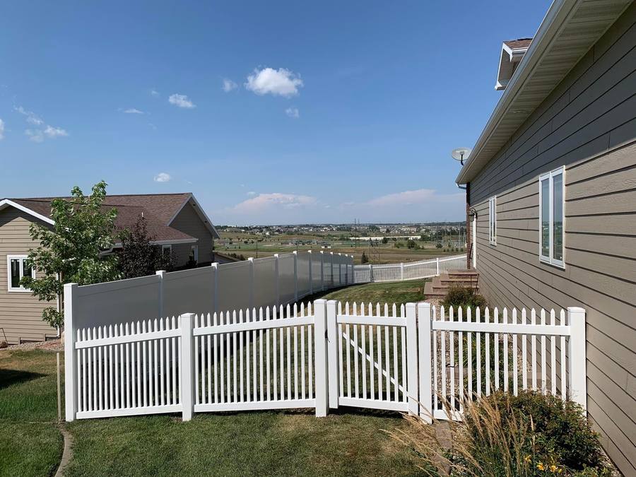 White vinyl picket fence
